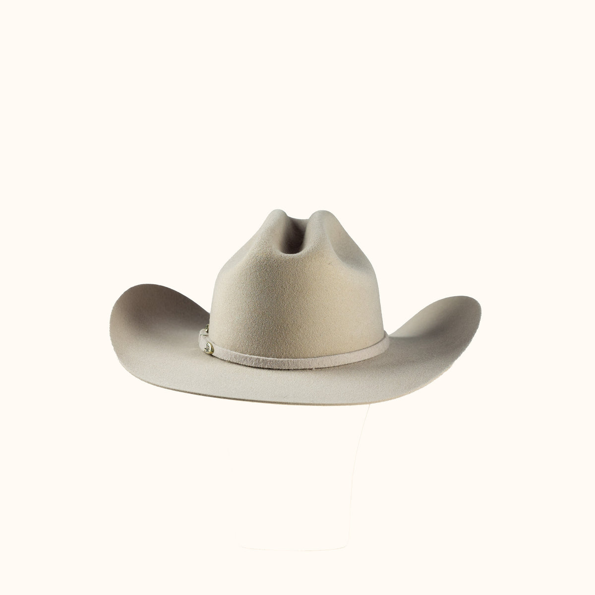 Beige cowboy hat on a white background