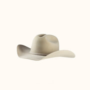 Beige cowboy hat on a white background