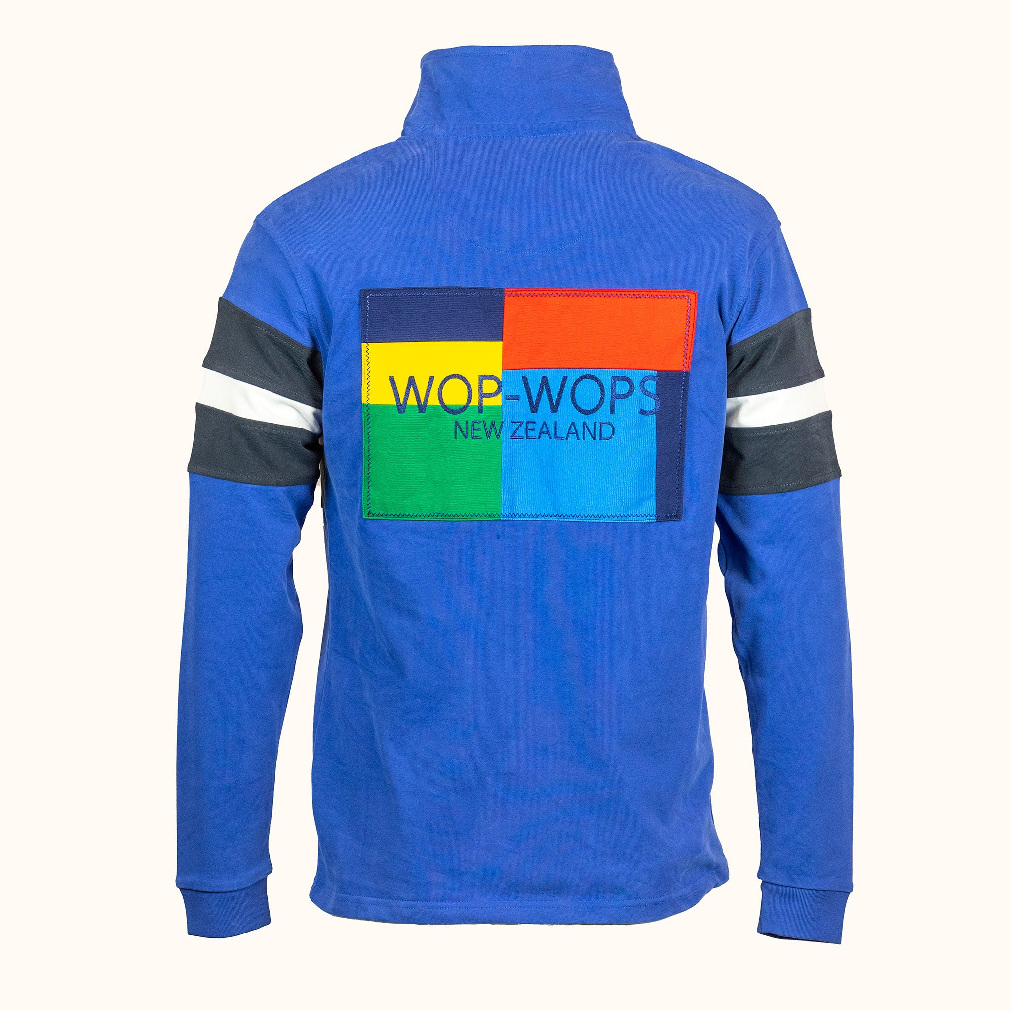 Blue quarter zip with colorful logo badge on the back on a white background